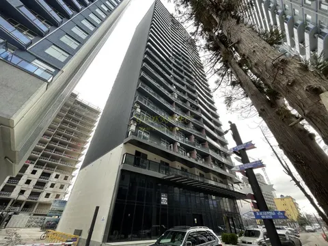 Новый жилой комплекс ,,NBG Tower" у моря в центре Батуми.
