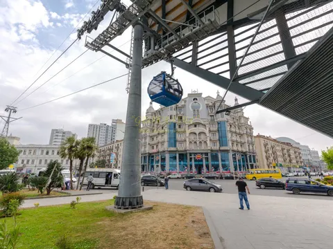 Новый дом в центре города у канатной дороги. Квартиры с видом на море и на город.