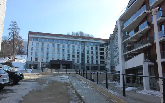 Новый жилой дом гостиничного типа ,,Орби Палас,,в горнолыжном курорте в Бакуриани. Апартаменты с видом на горы. Бакуриан