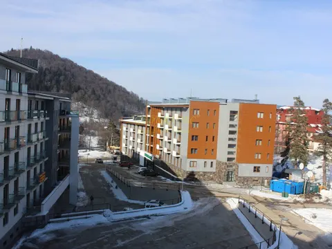 Новый жилой дом гостиничного типа ,,Орби Палас,,в горнолыжном курорте в Бакуриани. Апартаменты с видом на горы. Бакуриан