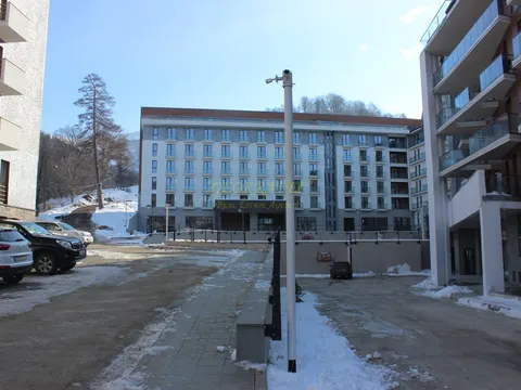 Новый жилой дом гостиничного типа ,,Орби Палас,,в горнолыжном курорте в Бакуриани. Апартаменты с видом на горы. Бакуриан