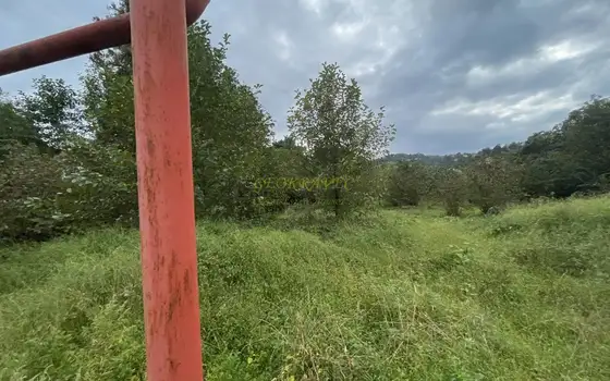 Продается земельный участок в тихом месте в Ахалсопели на берегу реки.