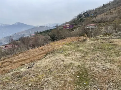На продаже участок в 15 км-ах от города Батуми и от побережья Черного моря прекрасным видом на горные пейзажи у маленькой реки.