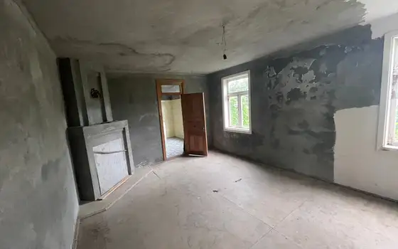 Продается частный дом с мандариновым садом и с видом на море в Чакви.
