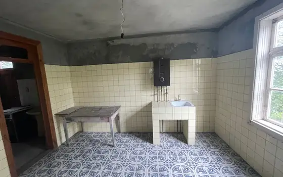 Продается частный дом с мандариновым садом и с видом на море в Чакви.