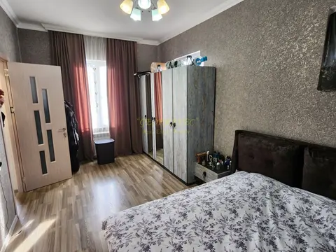 В городе Батуми в тихом районе, заселенном частными домами.