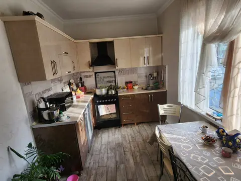 В городе Батуми в тихом районе, заселенном частными домами.