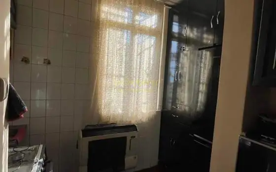В центре города Батуми, рядом с драматическим театром,  с морем и бульваром.