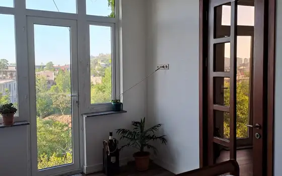 собственный дом с участком земли.