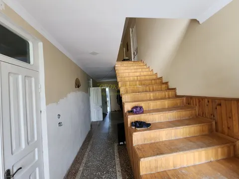 Двухэтажный частный дом с участком земли.