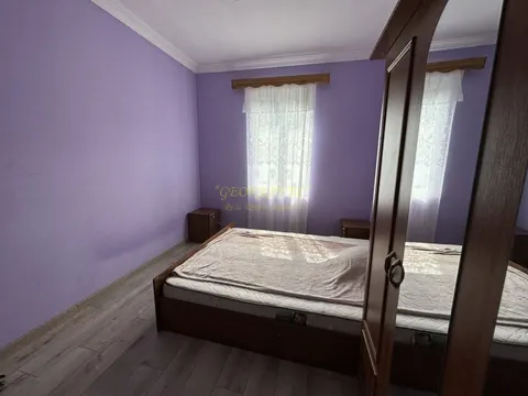 Дом с участком земли.