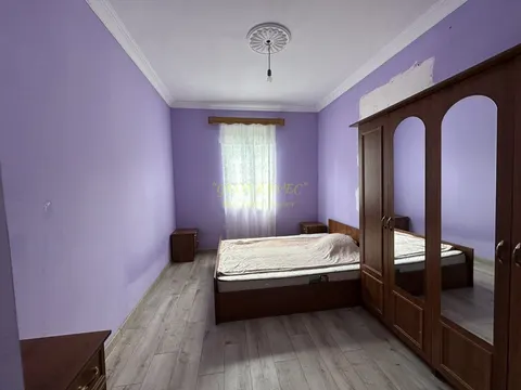 Дом с участком земли.